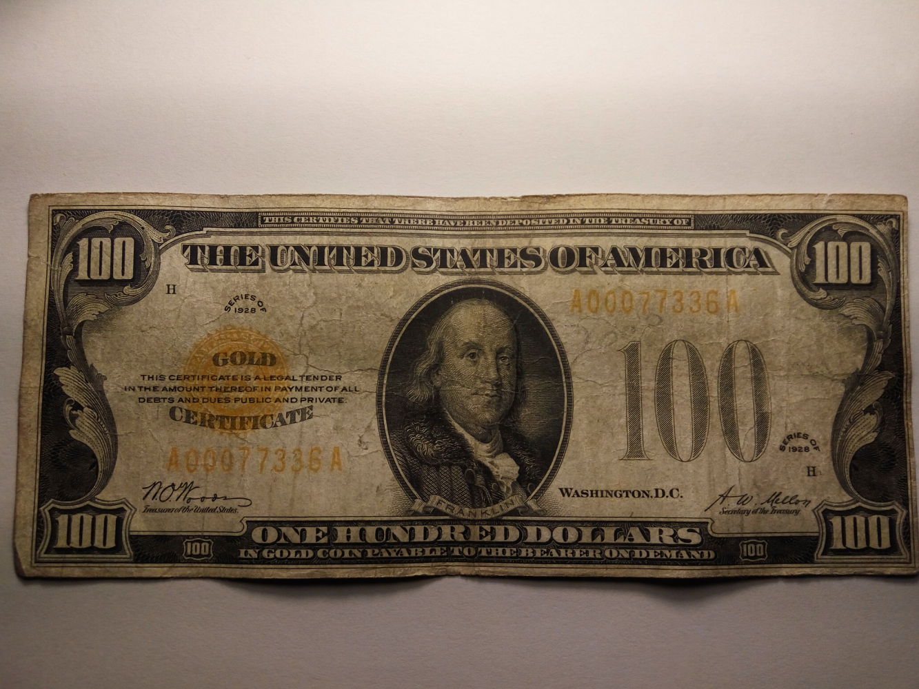 Valuation-$100-1928-Gold