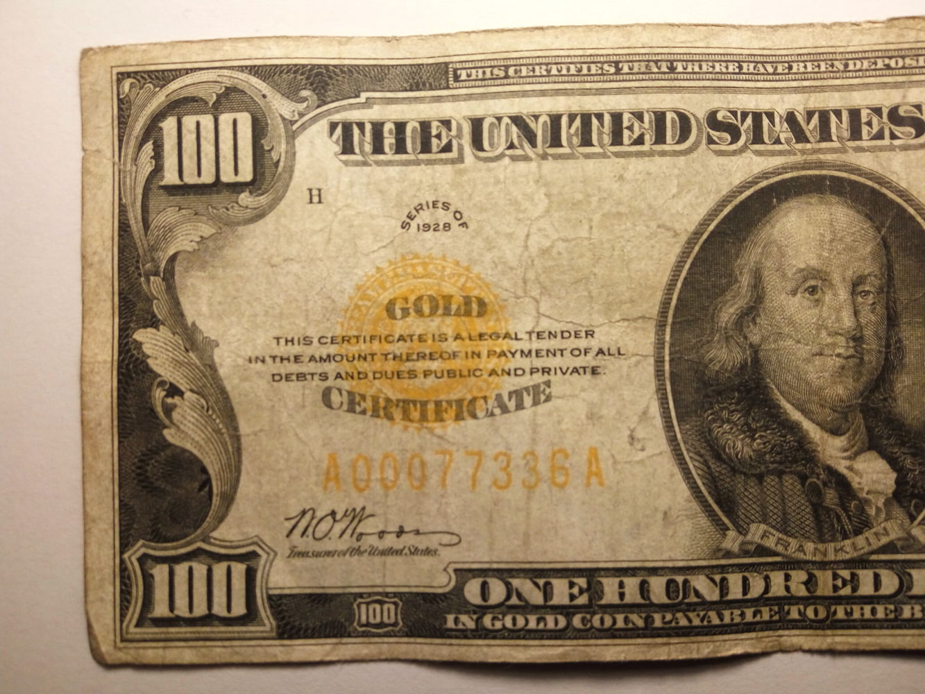 Valuation-$100-1928-Gold