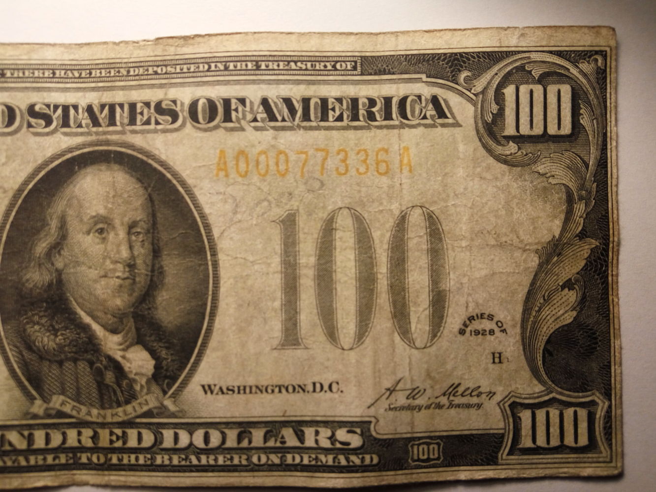 Valuation-$100-1928-Gold
