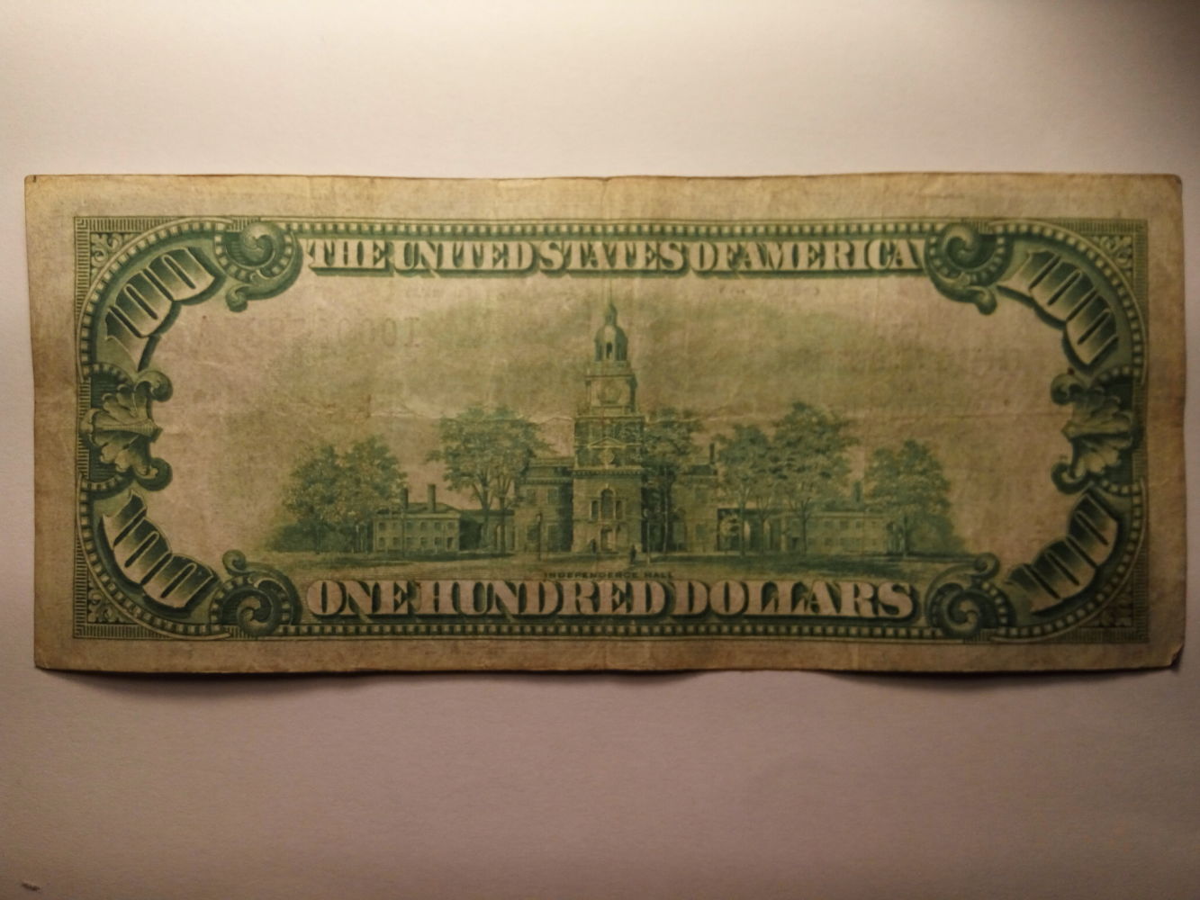 Valuation-$100-1928-Gold