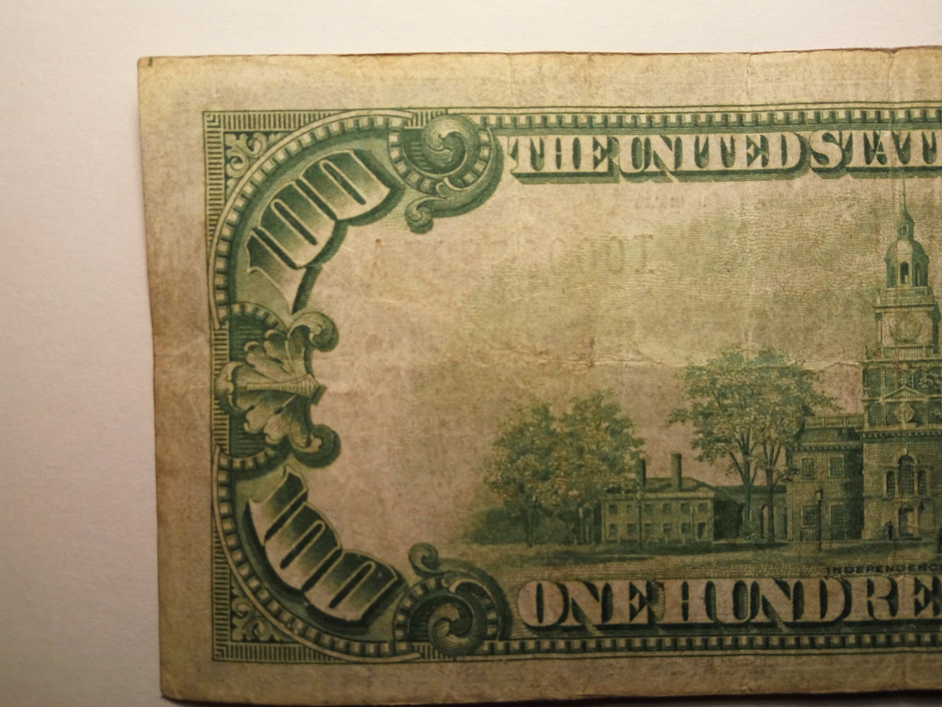 Valuation-$100-1928-Gold