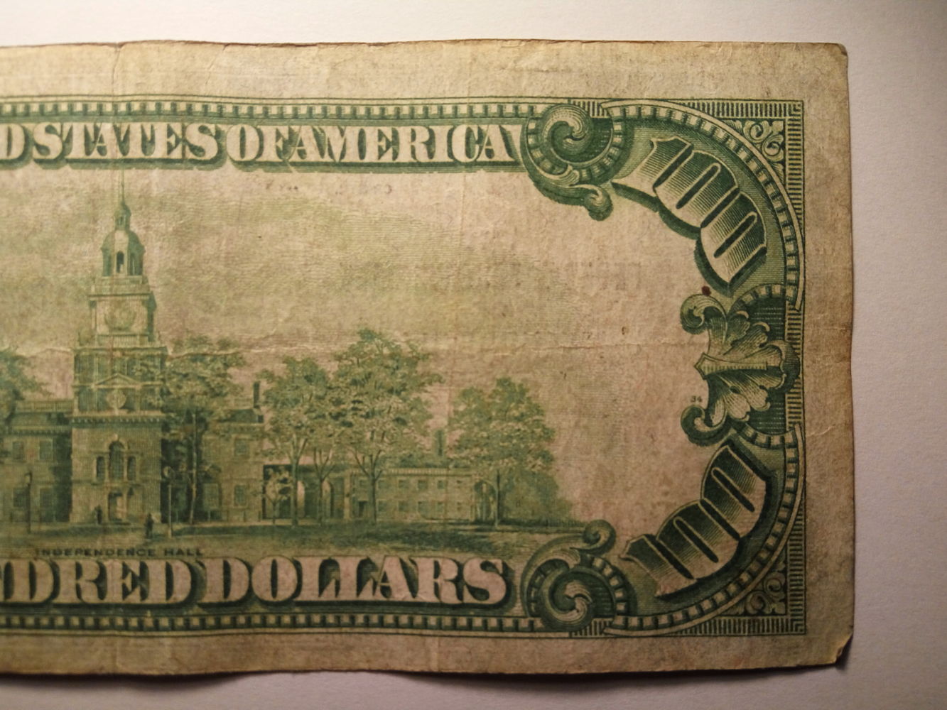 Valuation-$100-1928-Gold