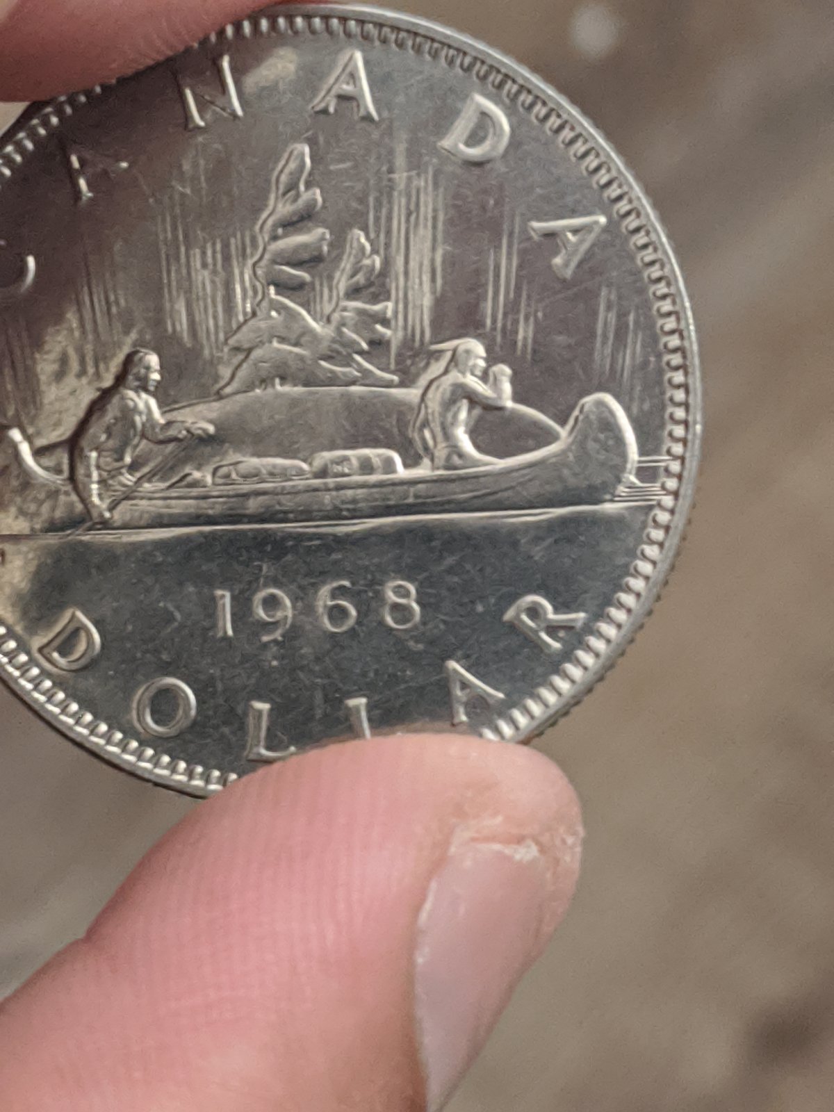 Is-The-1968-1$-Coin-A-Double-Horizon-Line-Variety?