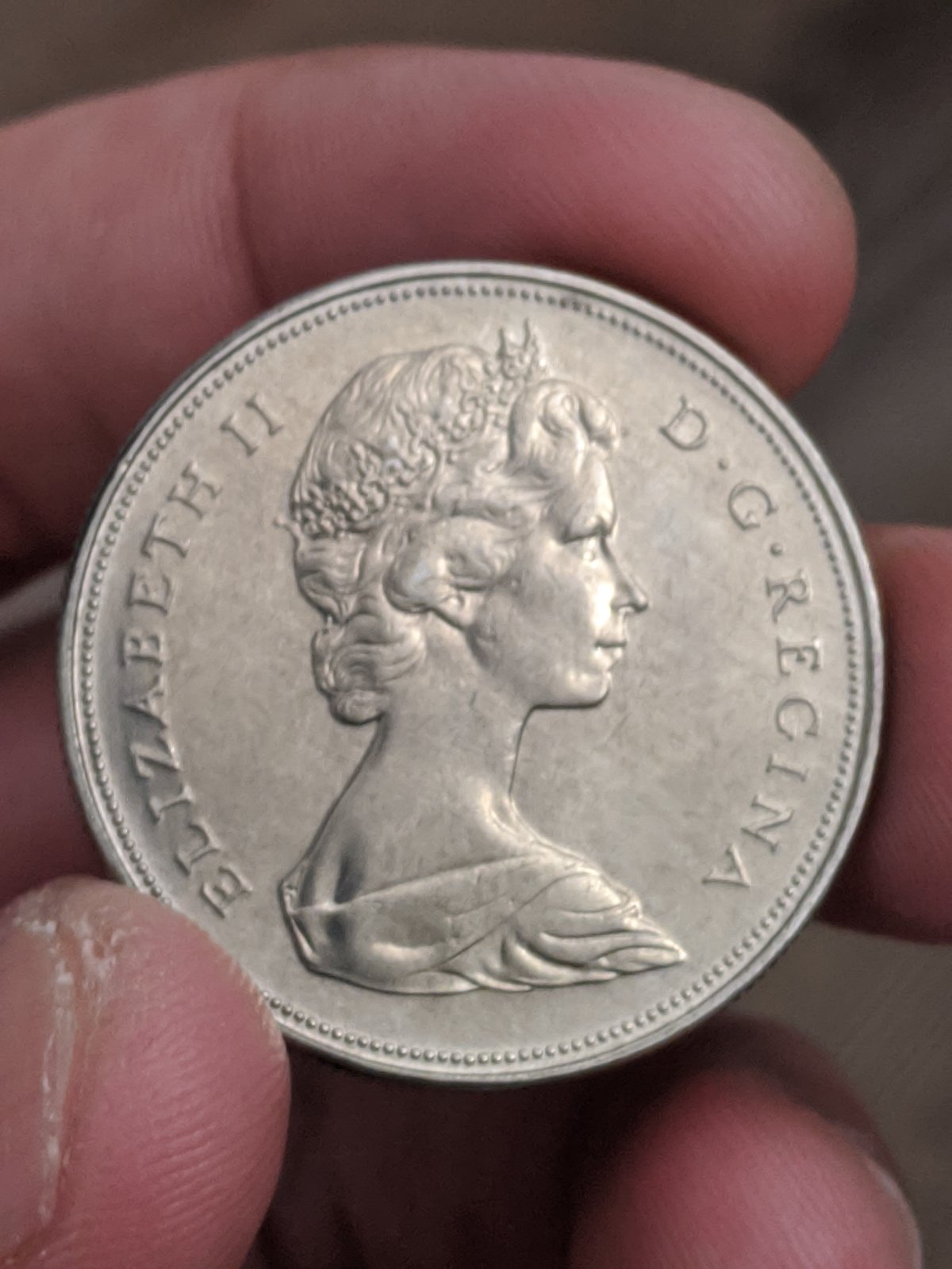 Is-The-1968-1$-Coin-A-Double-Horizon-Line-Variety?