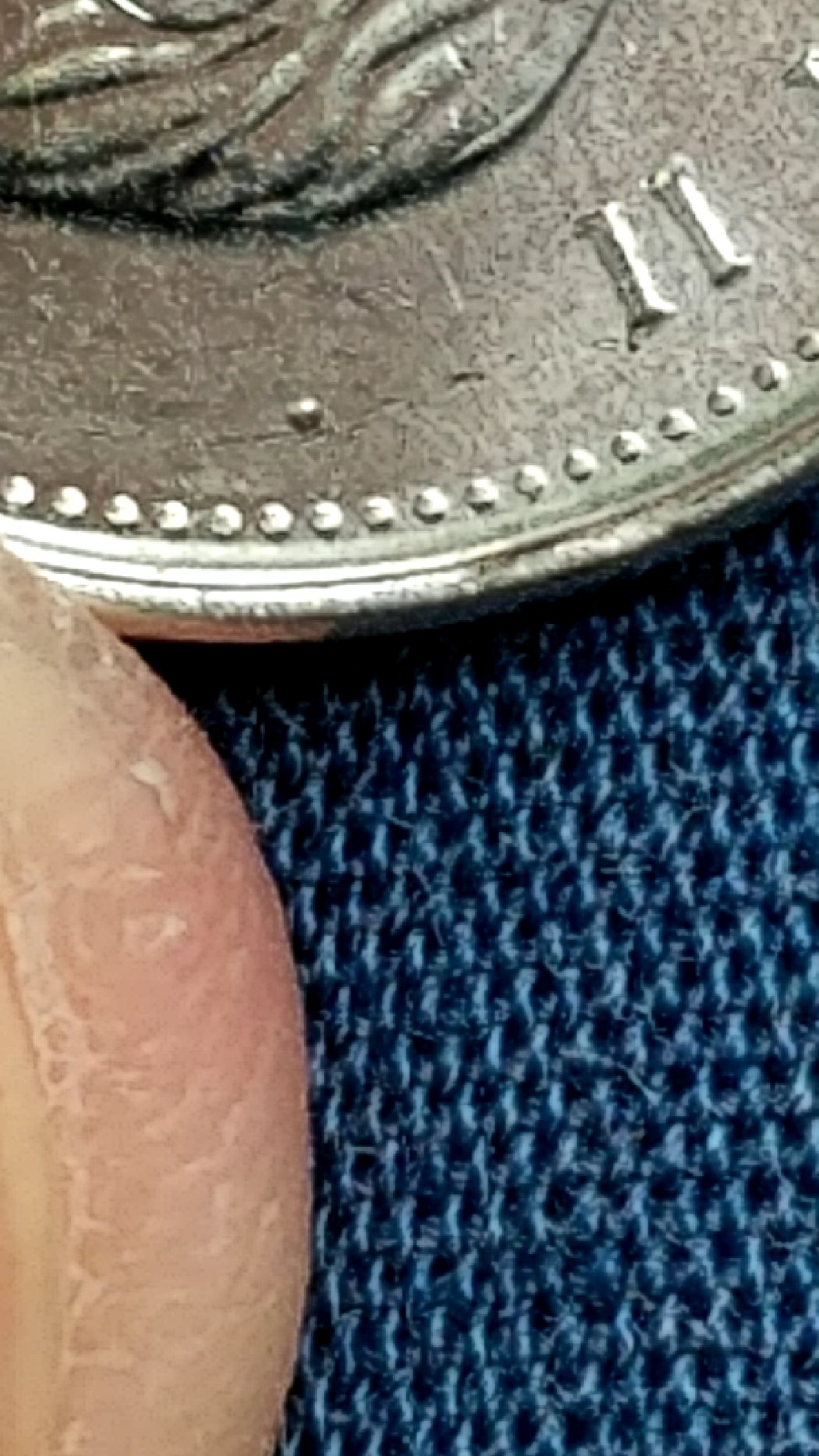 First-Dot-Coin-IV-Found.-Dot-Above-Queen's-Hair.-Is-This-Considered-An-Erro