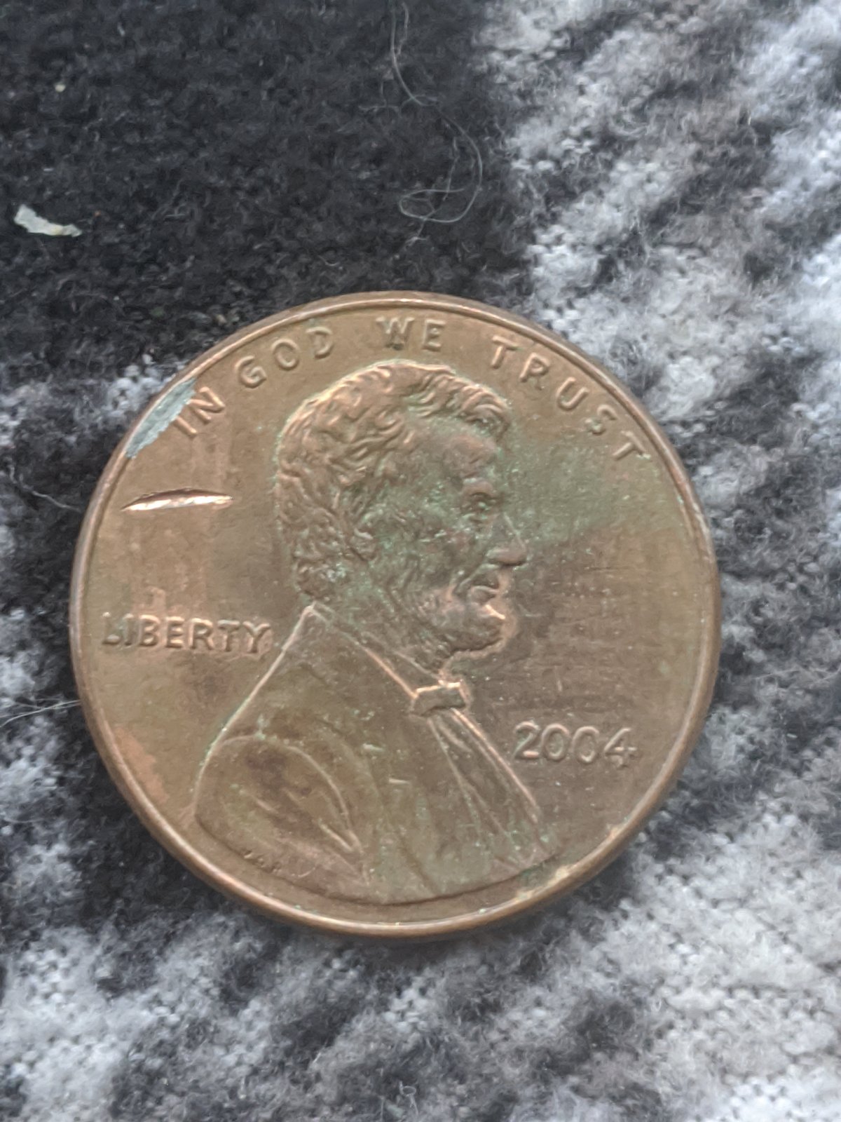 2006-Cent,-Is-This-Struck-Through-A-Foreign-Object-Or-PMD?