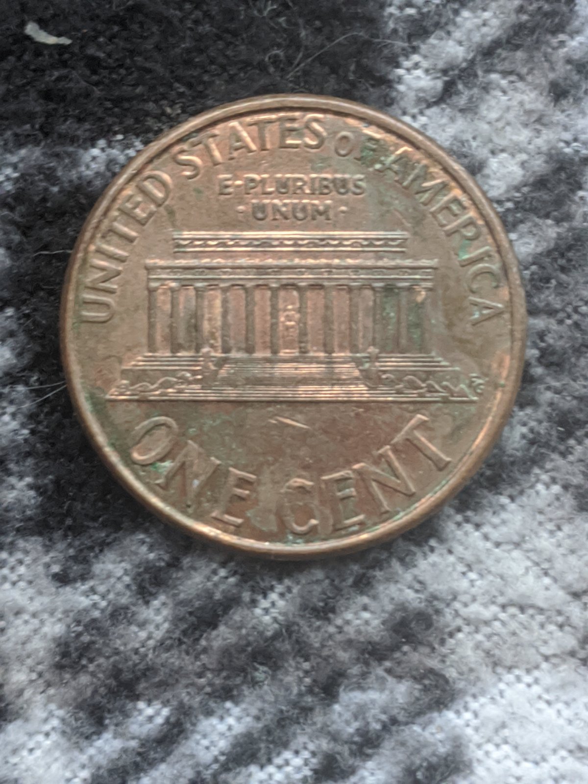 2006-Cent,-Is-This-Struck-Through-A-Foreign-Object-Or-PMD?