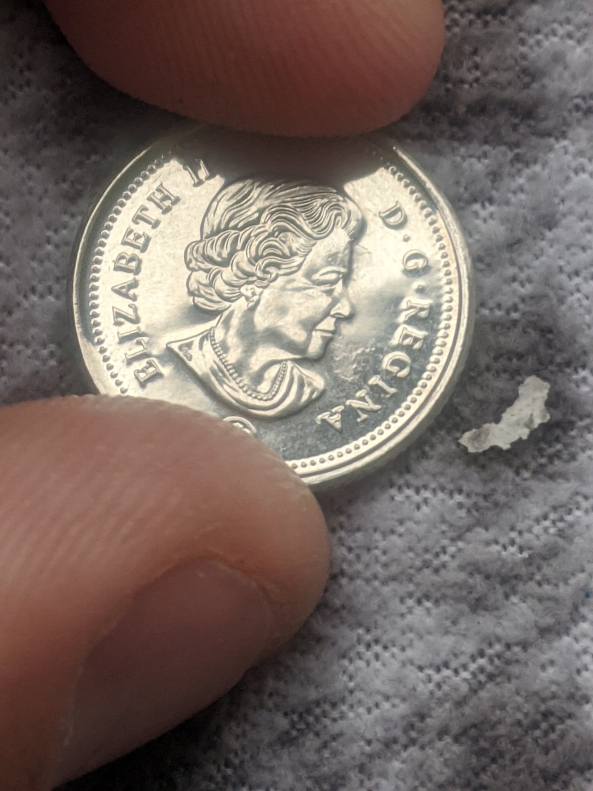 First-2021-New-Dimes-Found-In-Circulation.-One-Struck-Through-Grease.
