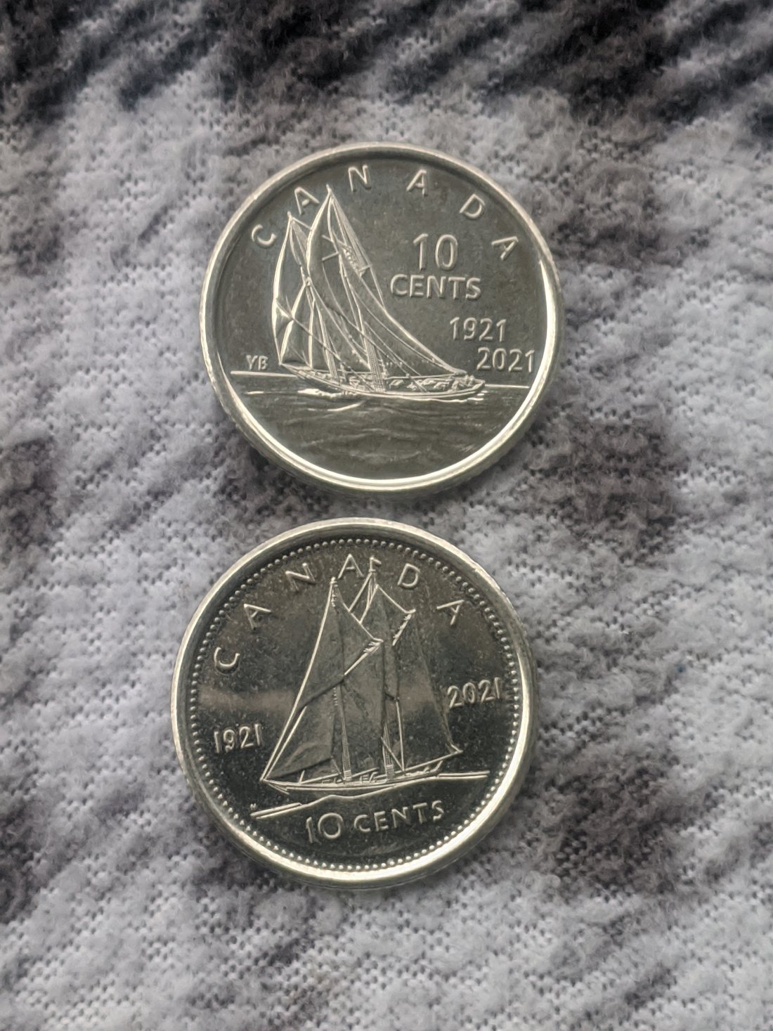 First-2021-New-Dimes-Found-In-Circulation.-One-Struck-Through-Grease.