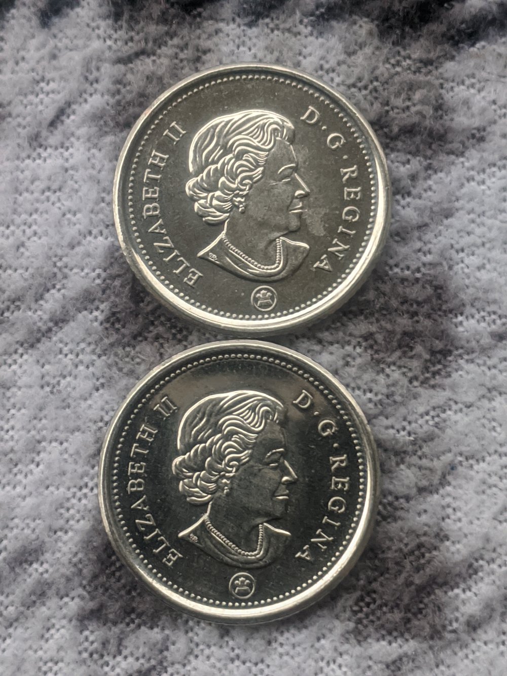 First-2021-New-Dimes-Found-In-Circulation.-One-Struck-Through-Grease.