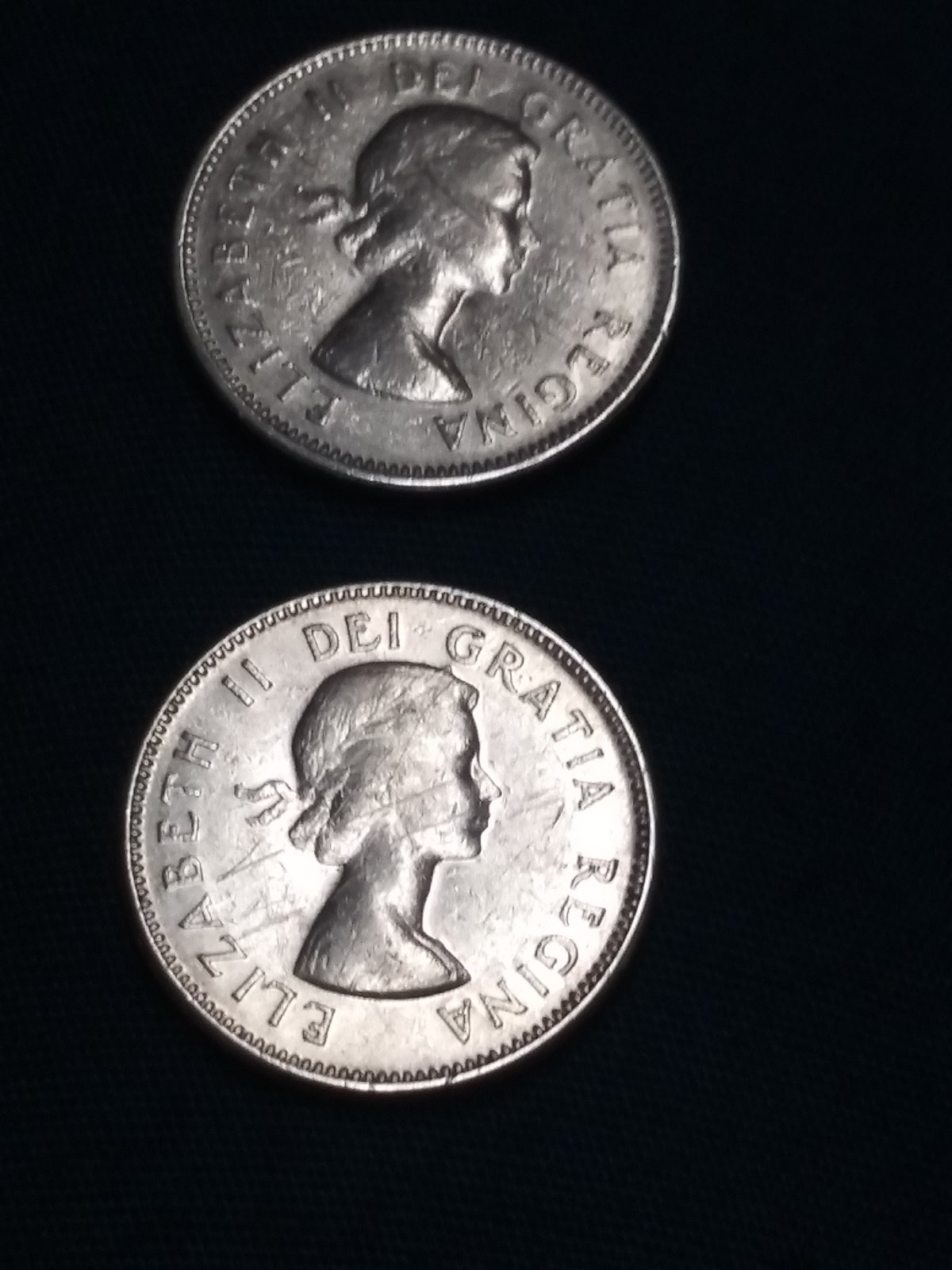 Few-1964-5cent,-Why-Is-The-Left-Leaf-Almost-Touching-The-Rim?
