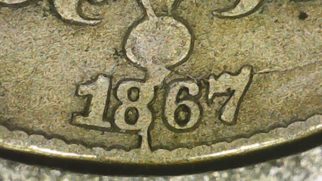 1867-Shield-Nickel.-Several-Die-Cracks.