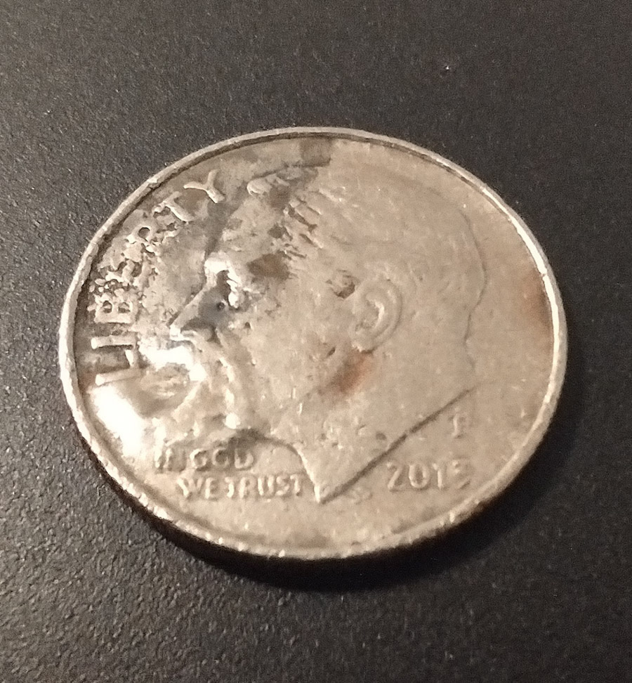 Occluded-Gas-Bubble-Or-Just-Heat-Damage?-2013-P-Dime
