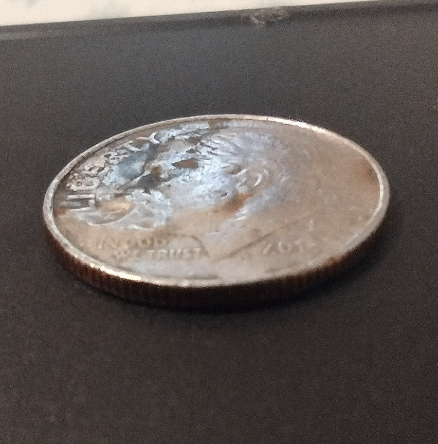 Occluded-Gas-Bubble-Or-Just-Heat-Damage?-2013-P-Dime