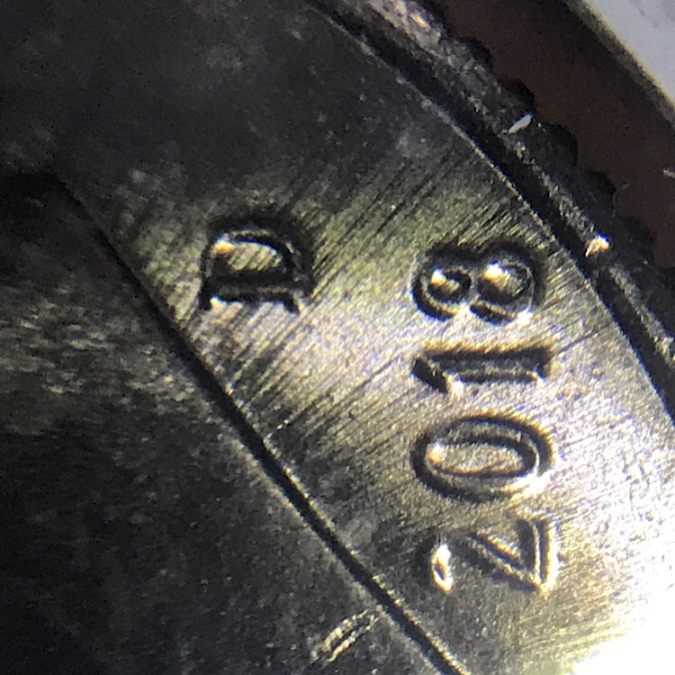 Explanation.-2018-D-Dime-With-What-Looks-Like-Light-Speed-Lines