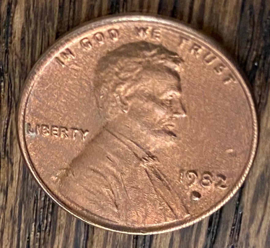 1982-Copper-Cent,-Strange-Texture-And-Filled-D-Mint-Mark
