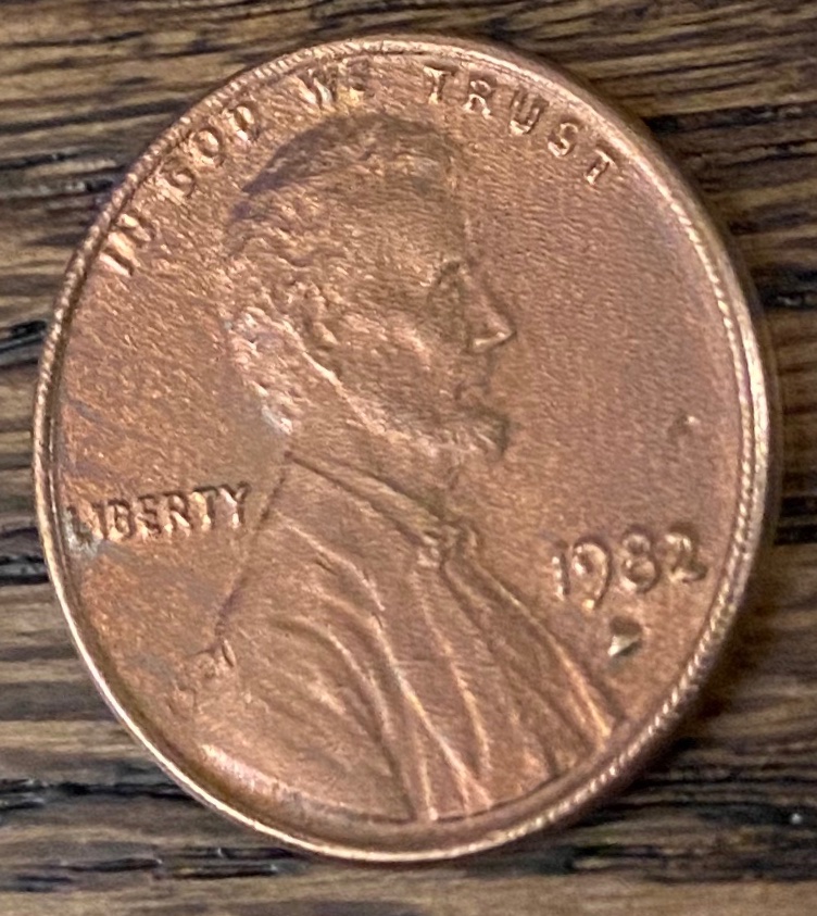 1982-Copper-Cent,-Strange-Texture-And-Filled-D-Mint-Mark