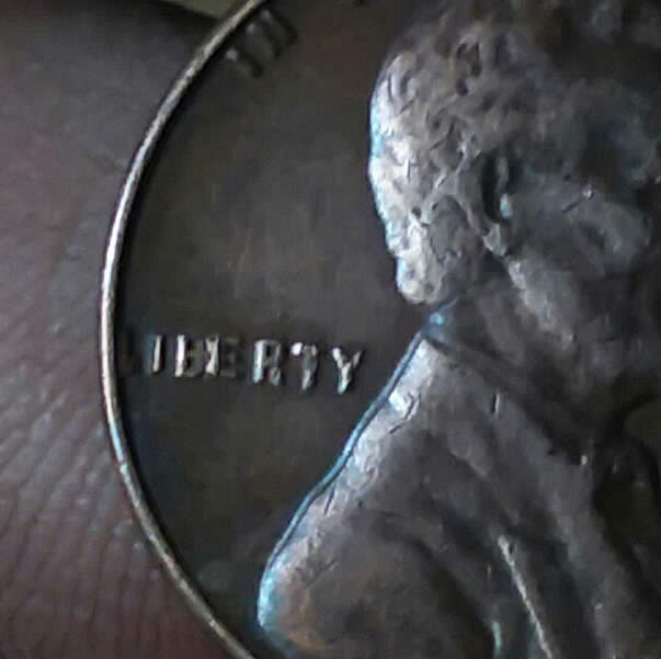 1957-Wheat-Penny-Strike-Error-Or-Post-Strike-Damage?