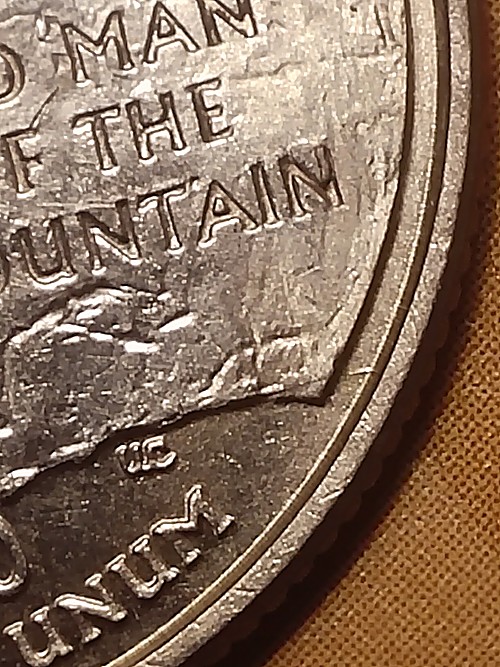 2000-State-Quarter-Die-Cracks-And-What-Looks-Like-A-Extra-Tail-On-The-Q