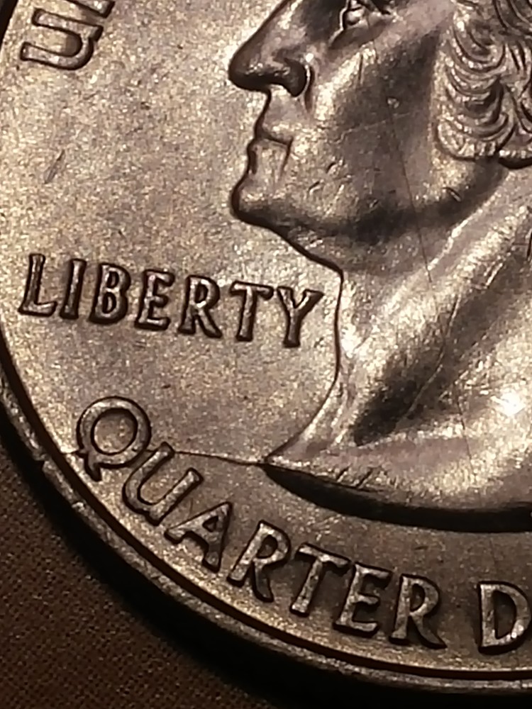 2000-State-Quarter-Die-Cracks-And-What-Looks-Like-A-Extra-Tail-On-The-Q