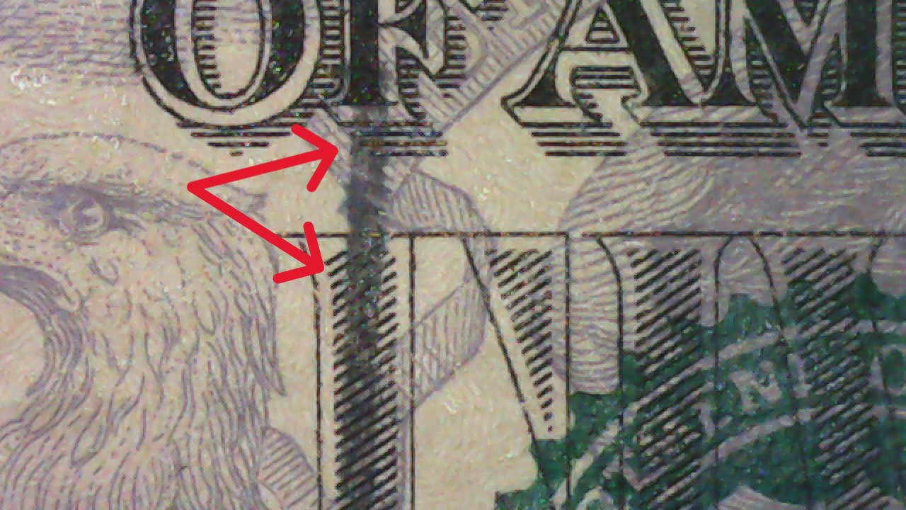 Black-Spear-Through-US-$5-Bill