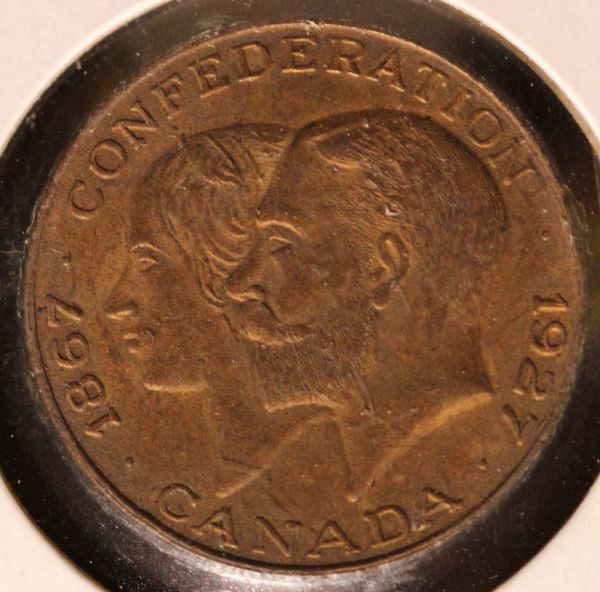 Two-Unc-Canadian-Tokens-&-One-Circulated-&-Worn---Film-@-11