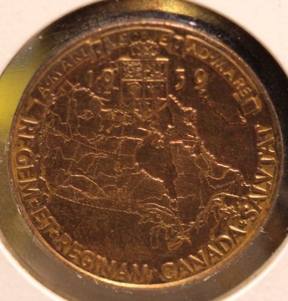 Two-Unc-Canadian-Tokens-&-One-Circulated-&-Worn---Film-@-11