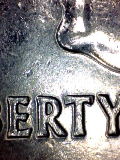 Northern-Mariana-25cents-&-1942-5cents-Coins-In-My-Change