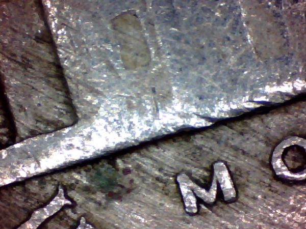 Northern-Mariana-25cents-&-1942-5cents-Coins-In-My-Change