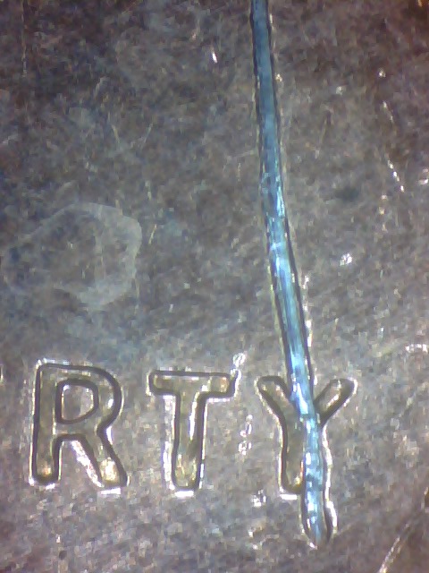 Odd-Scratch-Mark-On-96-Penny