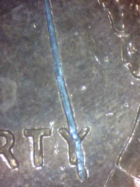 Odd-Scratch-Mark-On-96-Penny