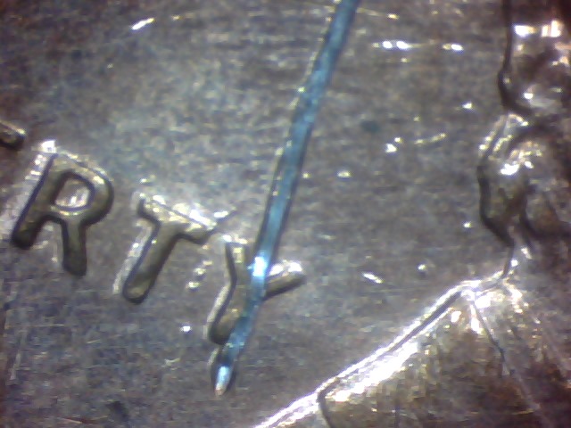 Odd-Scratch-Mark-On-96-Penny