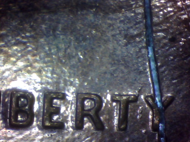 Odd-Scratch-Mark-On-96-Penny