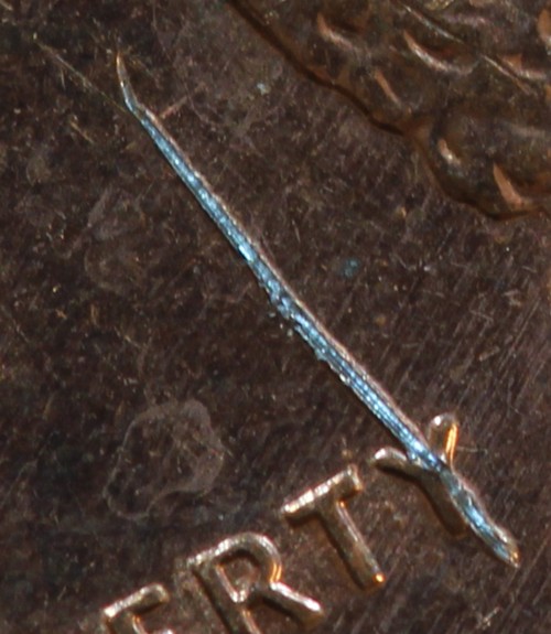 Odd-Scratch-Mark-On-96-Penny