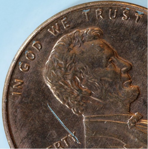 Odd-Scratch-Mark-On-96-Penny