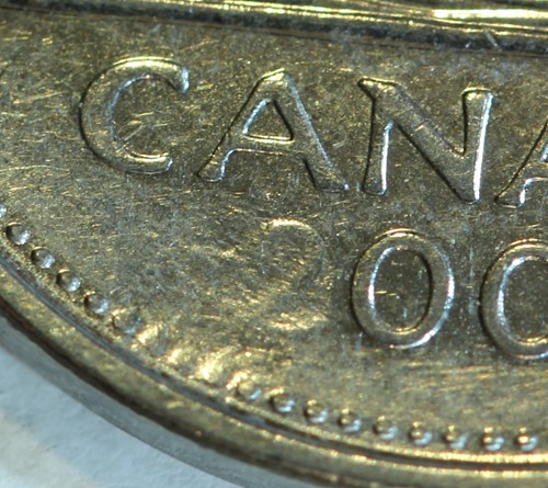 James-Bond-5-Cent-+-More