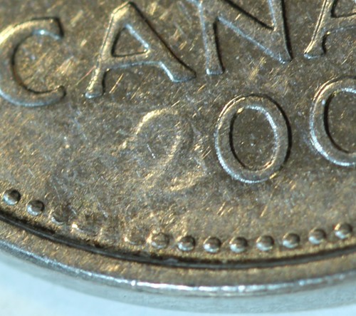 James-Bond-5-Cent-+-More