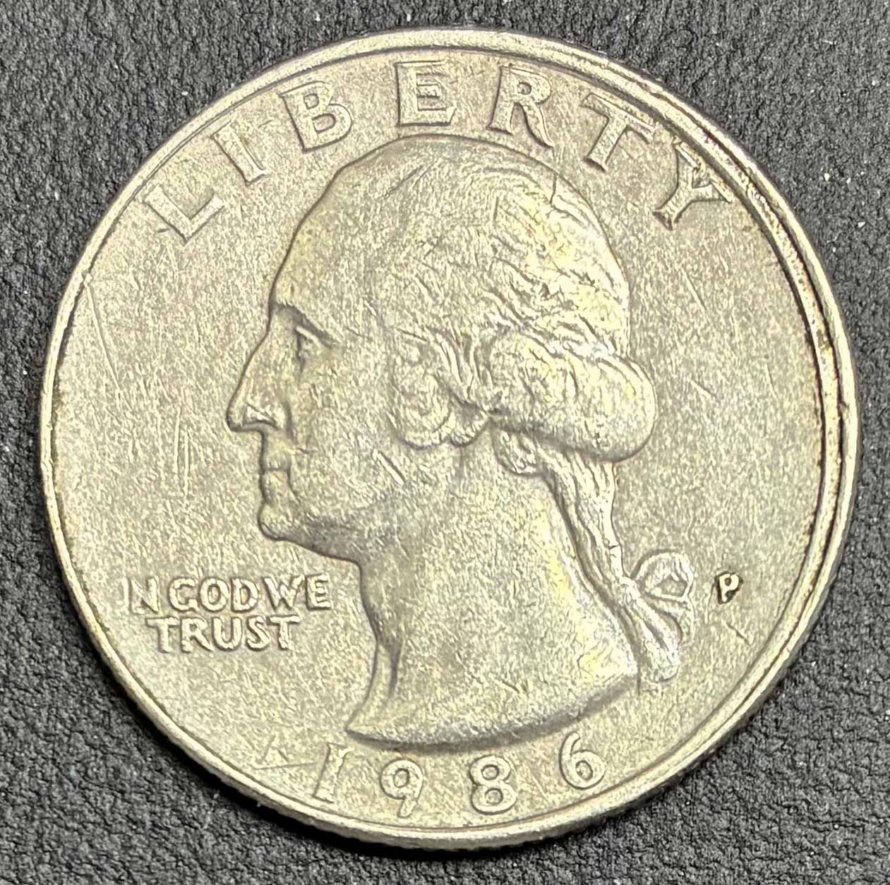 1986-P-Quarter-Partial-Strike?-Off-Center-Die-Contact?