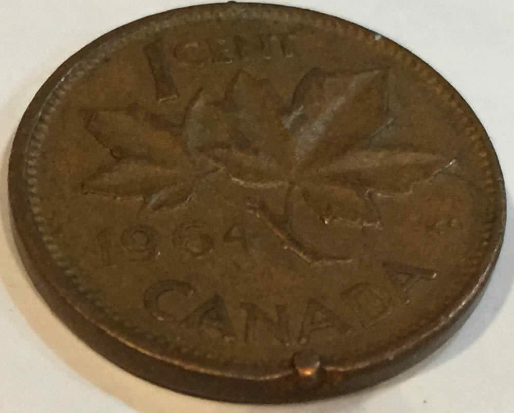 1964-Penny-With-Odd-Metal-Issue