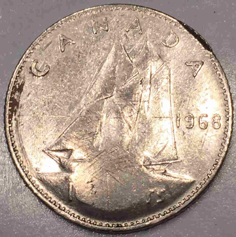 1968-Dime-Weird-Error-Or-PMD?