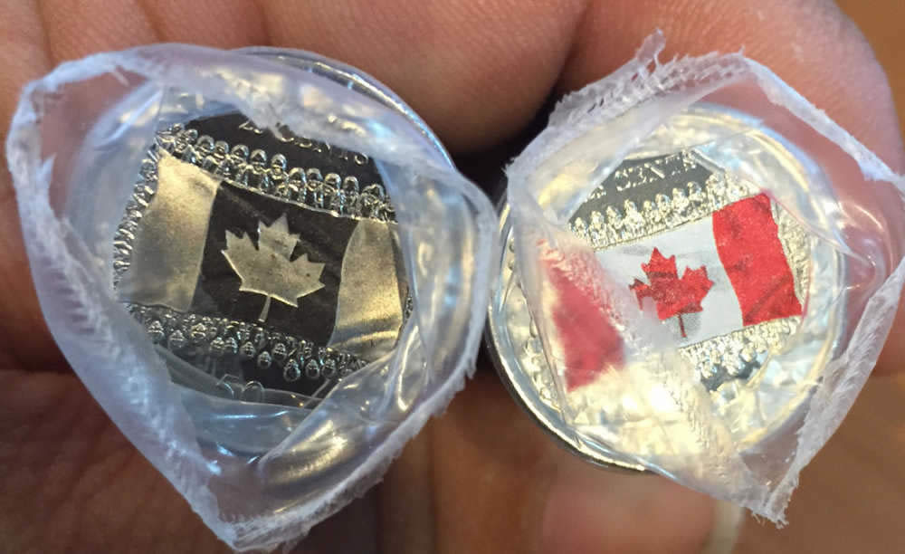 RCM-25-Cent-Circulation-Coin-Celebrates-50th-Anniversary-Of-The-Canadian-Flag