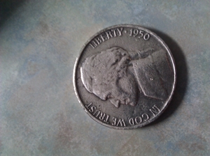 Nickel-That-Is-About-The-Same-Size-As-A-Fifty-Cent-Piece