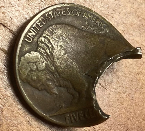 1935-Buffalo-Nickel-With-WW2-Bullet-Hole-?