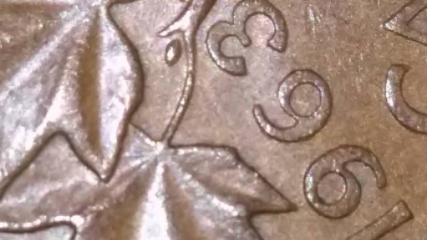 Does-This-1963-Canadian-Penny-Look-Like-The-3-Is-Hanging?