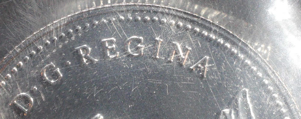2x-Canadian-1982-50-Cent-Large-Bead---Small-Bead?