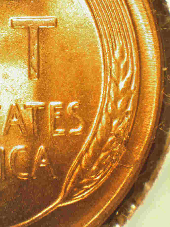 A-Funfilled-55,1955-S-1MM-002-Die-Chips-In-Date,-Cracked-Skull