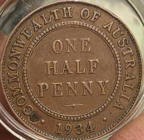 1934-Half-Penny-With-Something-Embedded?