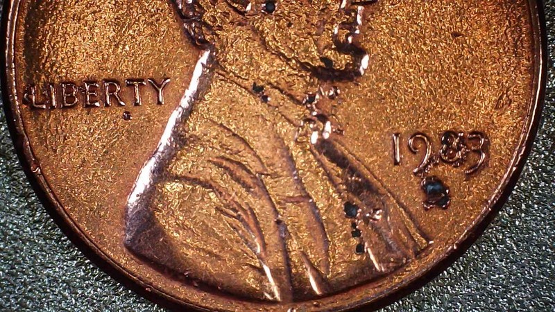 1983-D-Obverse-Plating-Bubbles-Attack