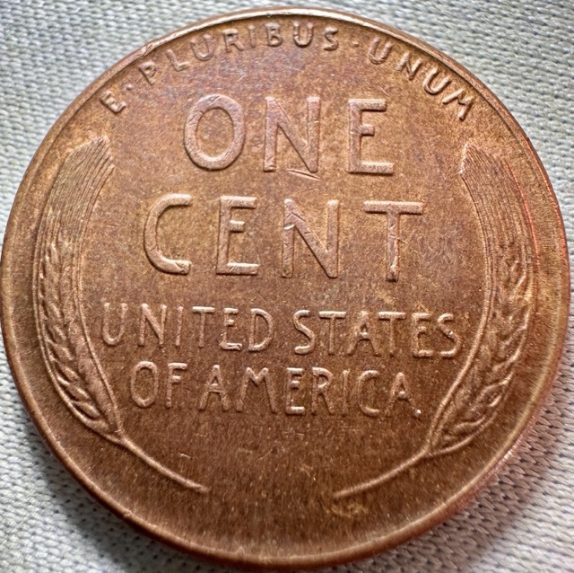 1957-Lincoln-Wheat-Cent-Cracked-Skull?