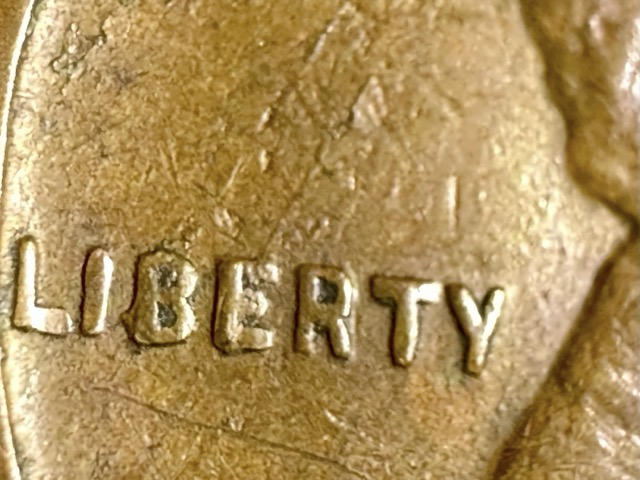 1932-Lincoln-Cent-Lamination+retained-Cud?